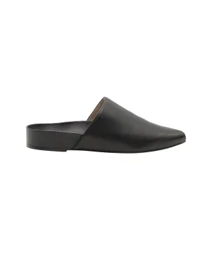 Stuart Weitzman Flat Mules in Black Leather